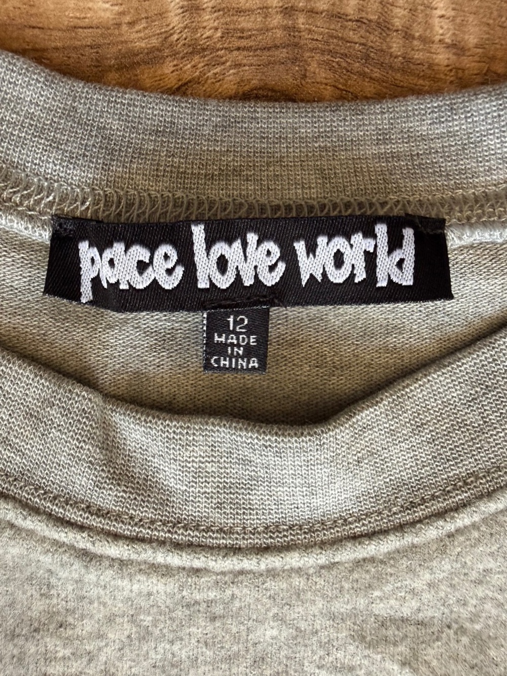 Peace Love World Comfy Graphic Top - Picture 7 of 10